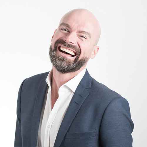 Mehmet Yılmaz - Med & Voyage Senior Real Estate Specialist presenting luxury villa blueprints to investors